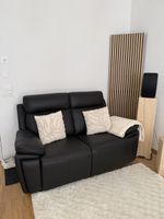 Neuwertiges schwarzes Ledersofa mit Relaxfunktion & Garantie