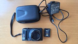 HIT: Nikon Coolpix S9100 mit Ladegerät und Hardcase (Hama)