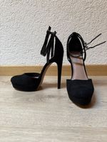 Eleganti scarpe nere con tacco alto, numero 36