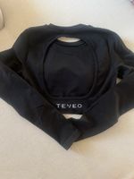 Schwarzes Sportoberteil von Teveo mit Rückenausschnitt