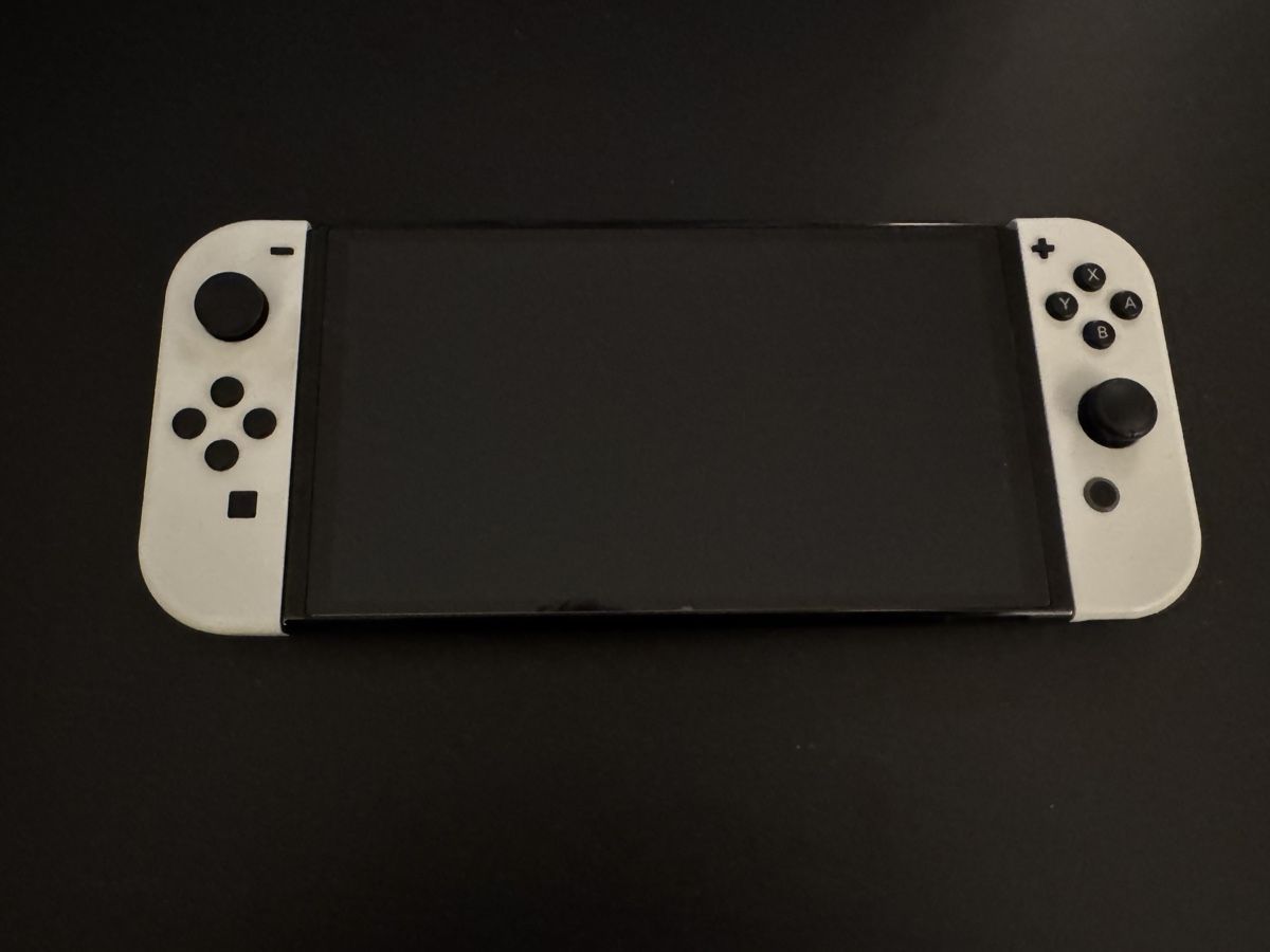 Nintendo Konsolen: Nintendo Switch OLED Modell weiss, gebraucht – Gebraucht aus Zürich von Trimtrab 1