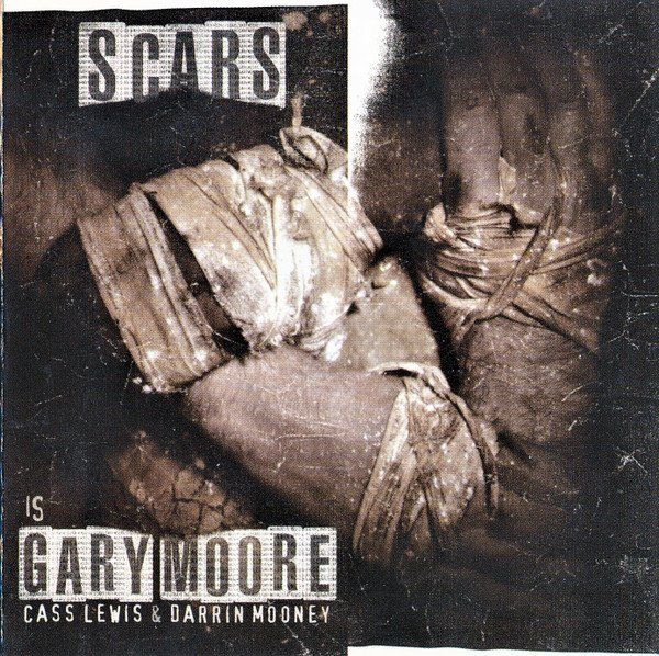 CD: CD Scars - Gary Moore / Lewis / Mooney (2002) – Usato da Möriken AG venduto da mineralia