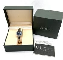 Gucci montre bracelet en acier avec boîte en excellent état 
