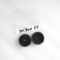 Nikon EE Sucherabdeckung 2x Stück / bouchons viseurs Nikon?