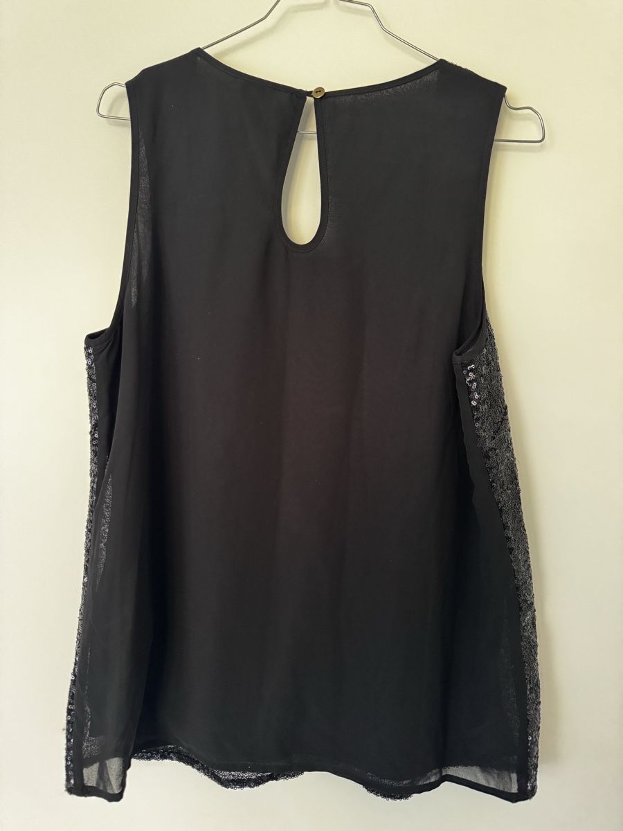Top: Schwarzes Pailletten-Top GR L – Usato da Zürich venduto da Manubene 1