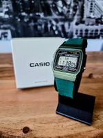 Neue Casio F91W – ungetragen / mit grünem Armband