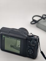 Canon PowerShot SX700 HS digital camera with charger
