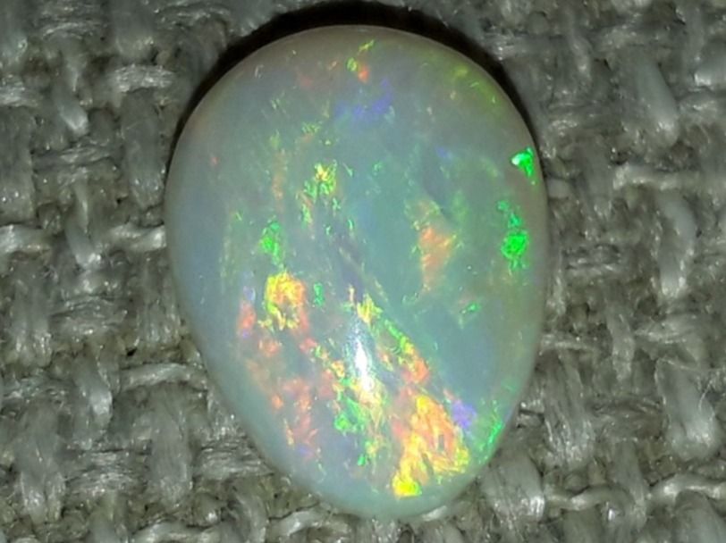 Pietre preziose: Australischer Multicolor Flashfire Opal 1.46ct – Nuovo e nell'imballaggio originale da Uerkheim venduto da Winwinner