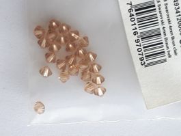 25 toupies Swarovski 4 mm brun clair