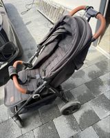 Poussette Kinderkraft noir avec poignees marron bon etat
