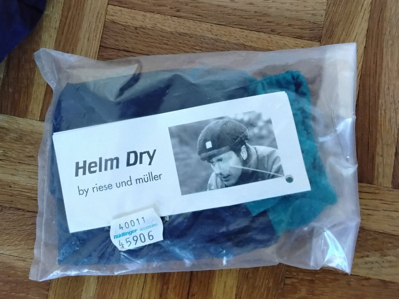 Caschi: Oldschool Regenschutzhabe Helm Dry Riese & Müller – Nuovo e nell'imballaggio originale da Lohn-Ammannsegg venduto da analogis 2