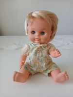 Beautiful flexible Doll with Blue Eyes and Blonde Hair.
