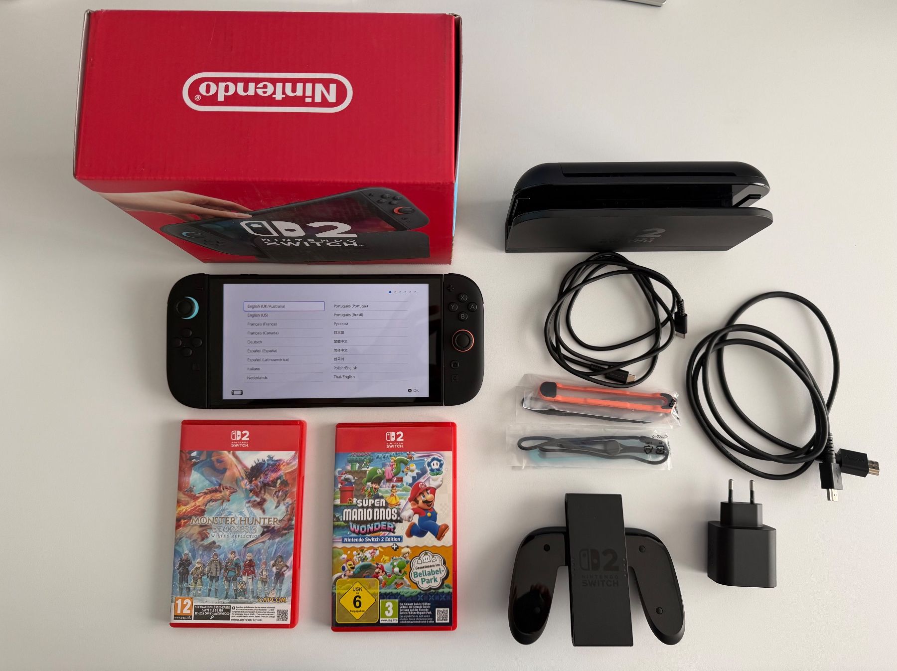 Nintendo Consoles: Nintendo Switch 2 inkl. zwei Nintendo Switch 2-Spiele – Neuf (Voir description) à Wollerau par Baechr