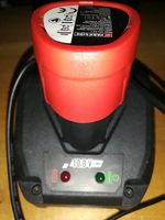 Ladegerät und Akku. 10.8V