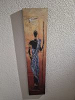 Wandbild afrikanische Figur mit Steinen, guter Zustand