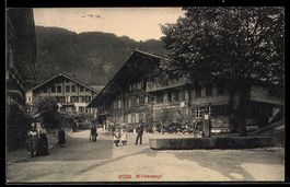 AK Wilderswil, Straßenpartie beim Brunnen