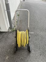 Garden hose reel with hose acceptable condition
