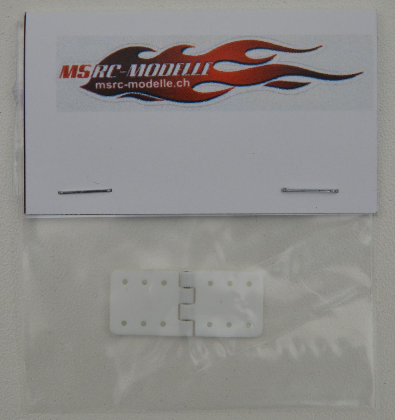 Modellismo RC: Scharnier Flach 12x24mm 1Stk. – Nuovo e nell'imballaggio originale da Rüti ZH venduto da MSRC-Modelle