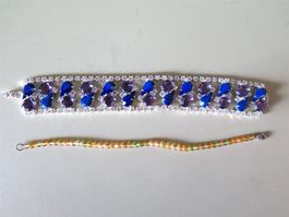 (22R)  ARMBAND, blau violette Steine
