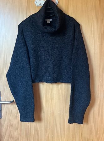 Pull noir à col roulé