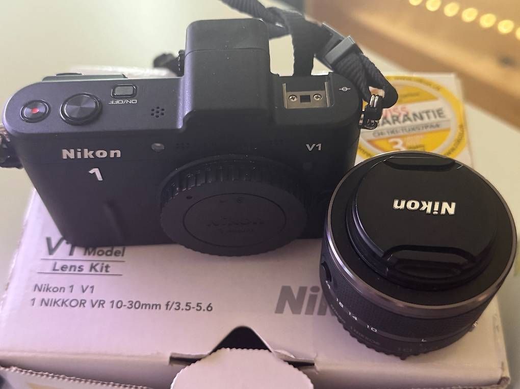 Nikon Fotocamera: Nikon 1 V1 Systemkamera mit 2 Objektiven, OVP, Ladegerät – Usato da Oberriet SG venduto da inagrella 3