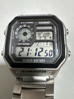 Montre Casio AE-1200WHM homme digital argenté bon état