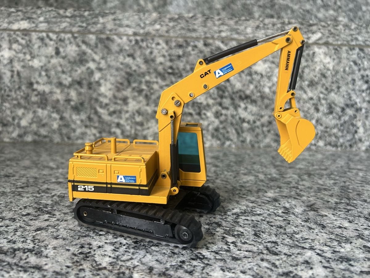 Caterpillar Bagger: Caterpillar 215, 1:50, NZG – Gebraucht aus Horw von Tigercat635 1