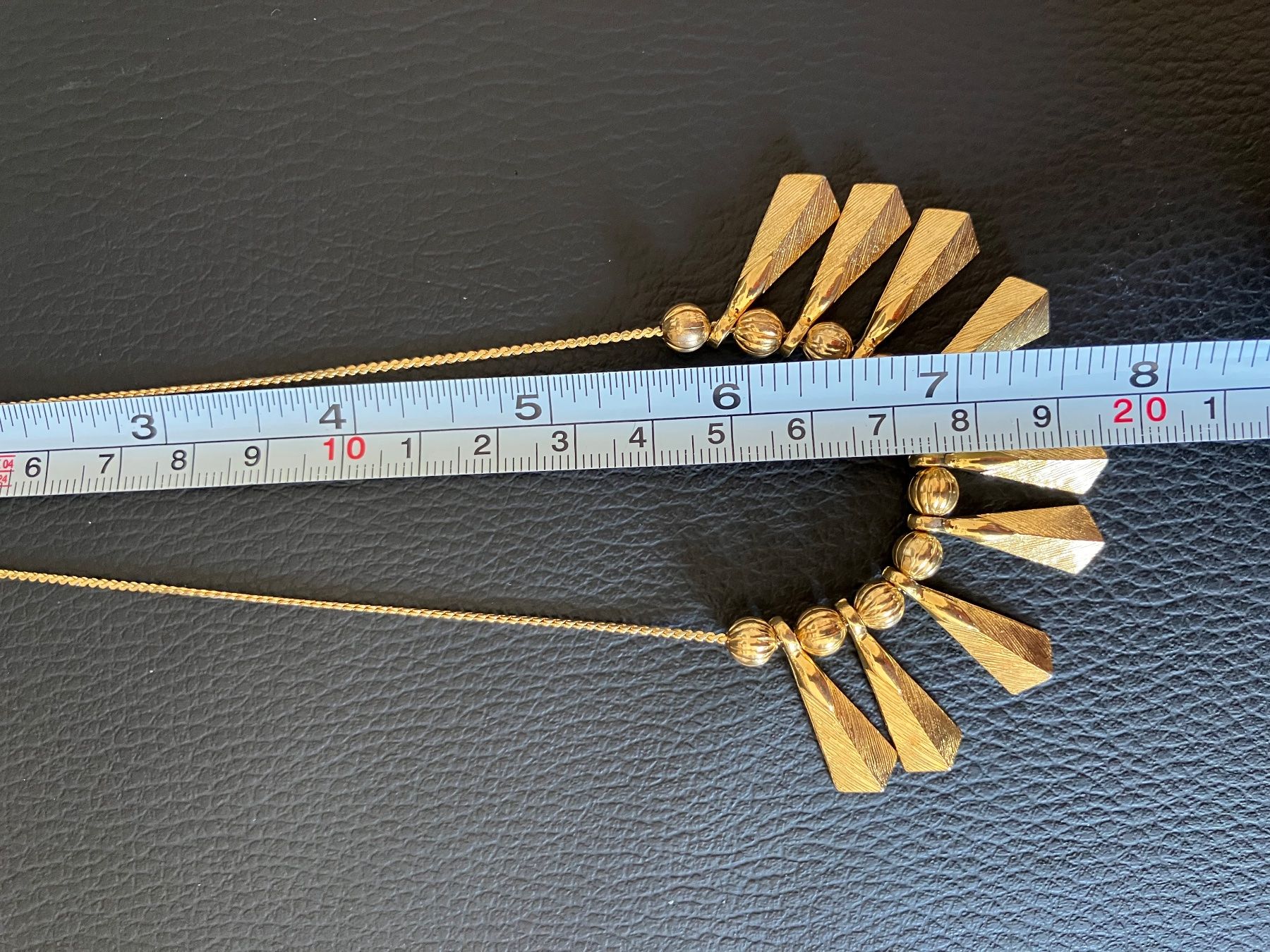 Catenine: Collier vintage doré à franges – Usato da Peseux venduto da Cresus27 5