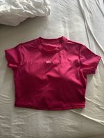 Alo Yoga Damen Sport-Top Pink  