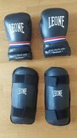 Set boxe Leone guantoni + parastinchi nero/bianco rosso