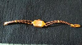 Montre femme ORIS. Ancienne, TBE, fonctionne, et ferme bien.