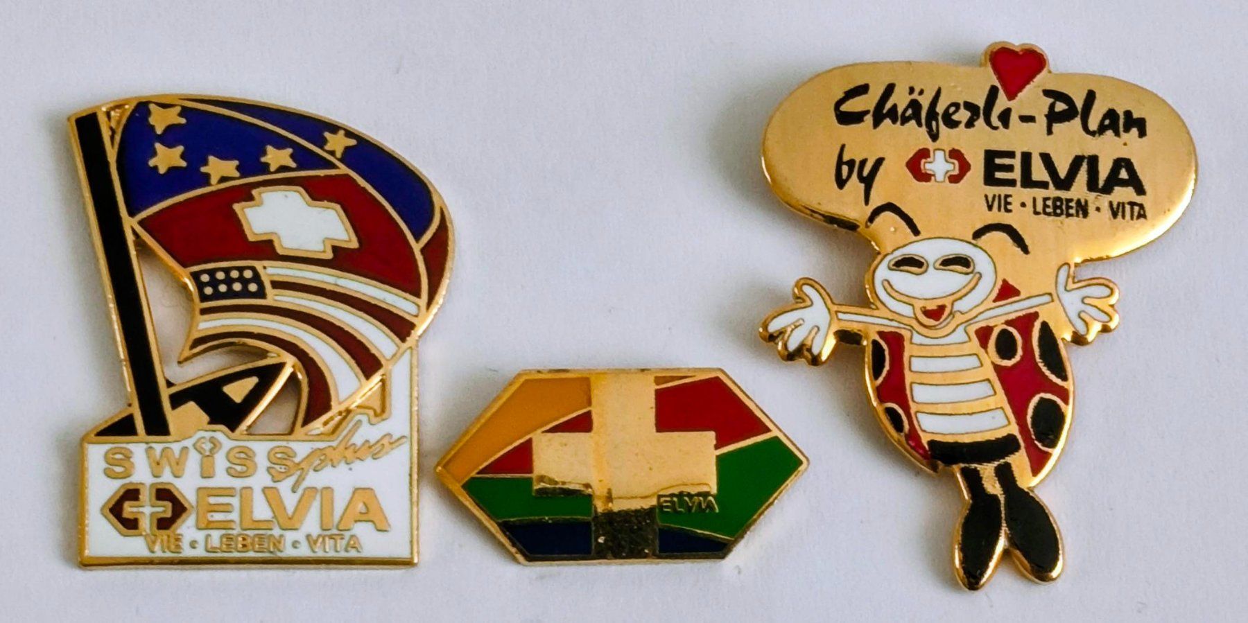 Plaketten & Abzeichen: 3  Pin ELVIA Versicherung – Gebraucht aus Pfäffikon ZH von Colacity