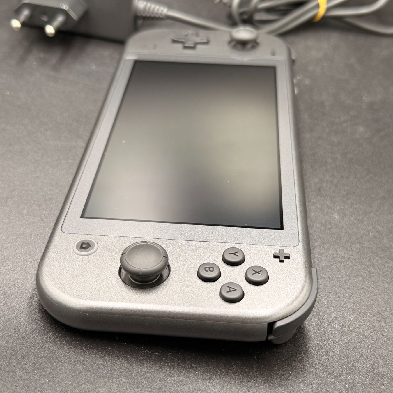 Nintendo Console: Nintendo Switch Lite Dialga & Palkia Edition mit Ladekabel – Usato da Düdingen venduto da Nerdworld 3