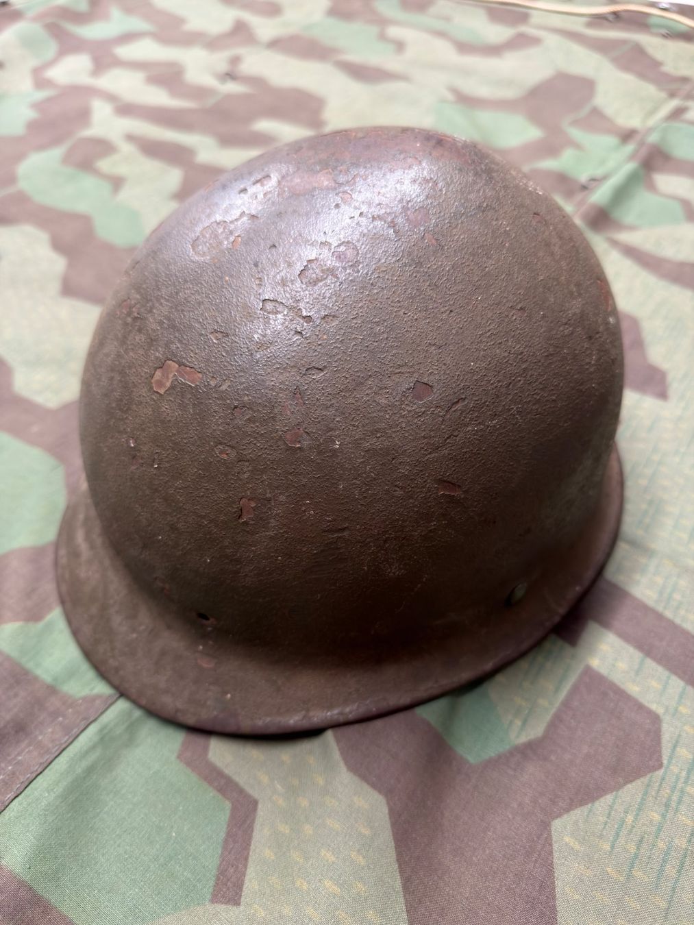 Uniformi: Stahlhelm M-1 Glocke – Usato da Bauma venduto da SwissMilitaria