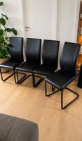 4 chaises en cuir noir 