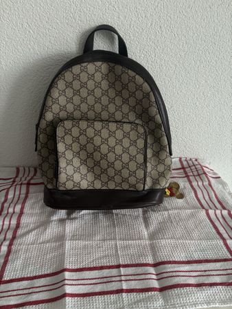 Gucci GG Supreme canvas backpack used condition