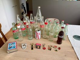 Coca-Cola Flaschen mit Zubehör