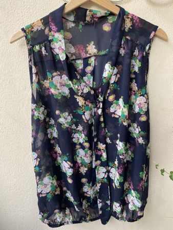 Blouse sans manches imprimé floral bleu marine taille M