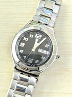 Swatch Irony Uhr Edelstahl schwarz Zifferblatt 