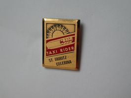 Taxi Rider, St. Moritz-Celerina Pin. Farbe Rot.