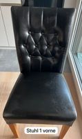 4 schwarze Stühle aus Kunstleder