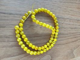 Natursteinperlen gelb 6mm