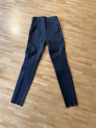 High-waisted leather pants