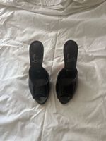 Black Loubutin heels
