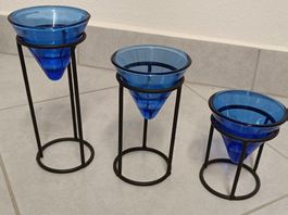 PHOTOPHORES (3 pièces) + SUPPORTS.  Env. 17, 13 et 9 cm