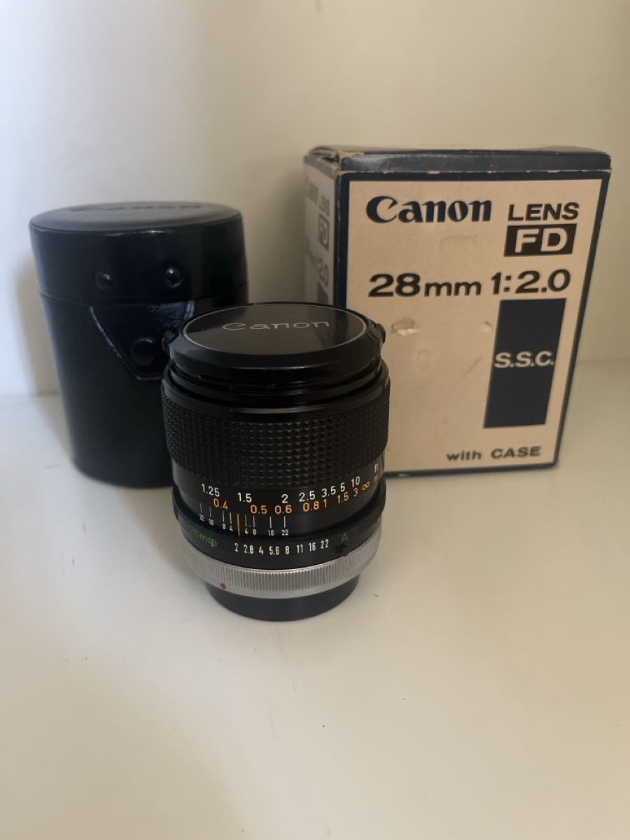 Canon Obiettivi: Canon FD 28mm 1:2.0 S.S.C. Weitwinkel-Objektiv – Usato da Allschwil venduto da mpant02