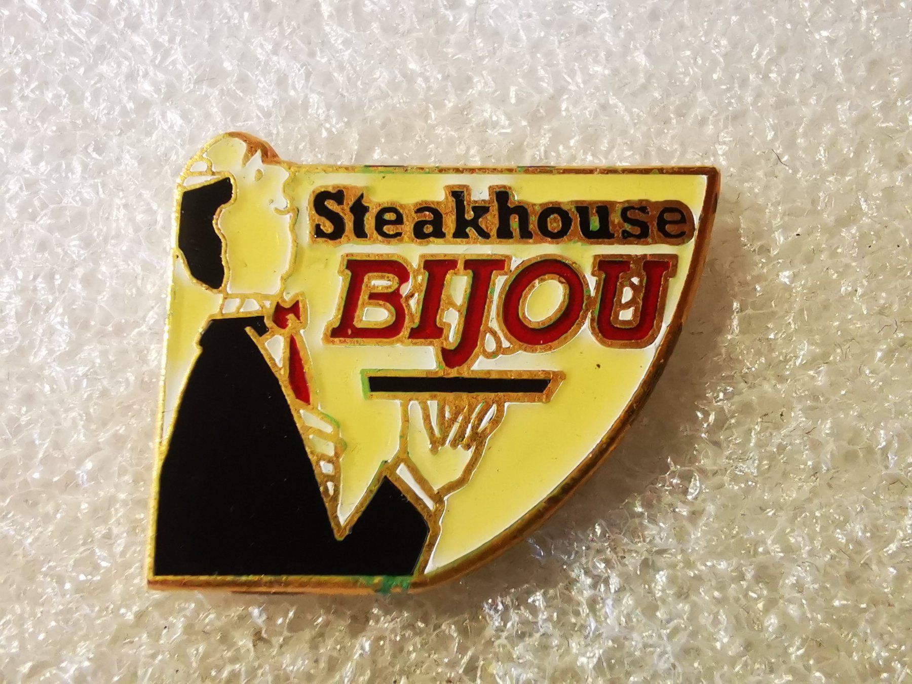 Placchette & Badge: Ansteckpin 149: Steakhouse Bijou – Usato da Oppligen venduto da Pin-Fall-Shop