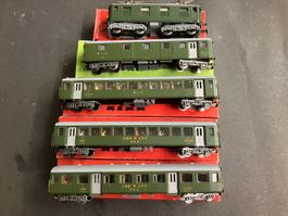 Kleinbahn Re 4/4, 4 Wagen mit Licht/Passagieren,rote Schluss