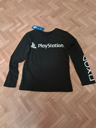 T-shirt Playstation neuf avec étiquette taille 7/8 ans
