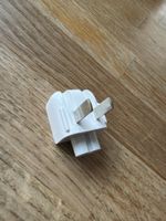 „Duckhead“-Stecker für ein Apple-Netzteil